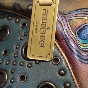 ANUSCHKA hand painted peacock feather.